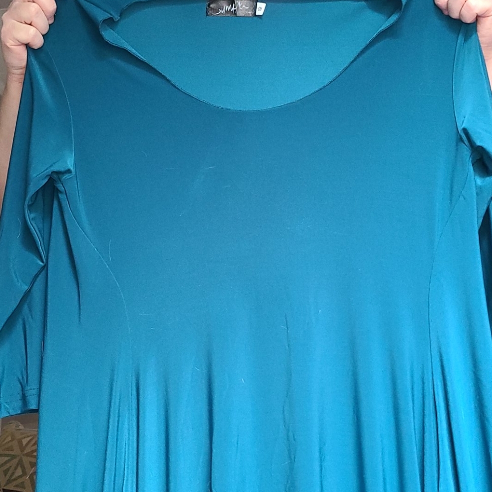 Blue dress with cut out ruffle bottom